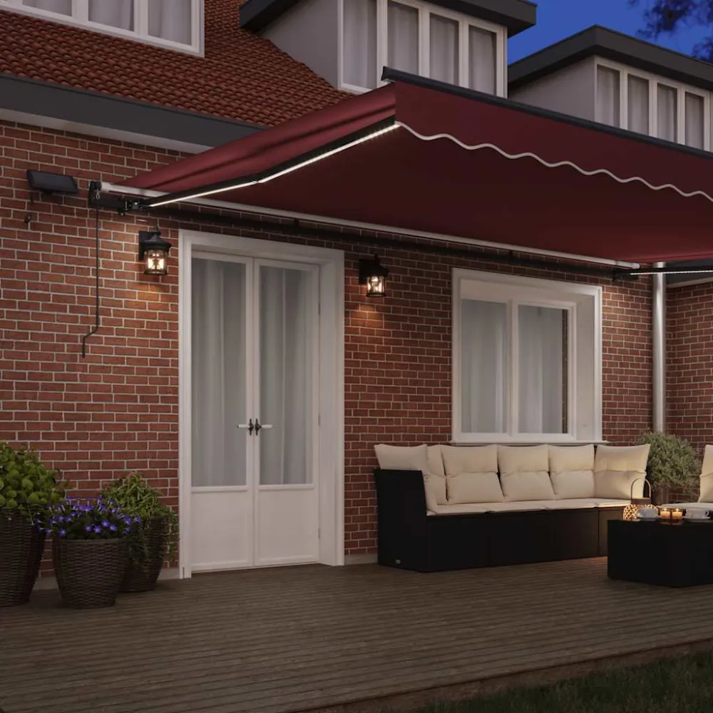 vidaXL burgundi vörös kézzel kihúzható LED-es napellenző 500 x 300 cm