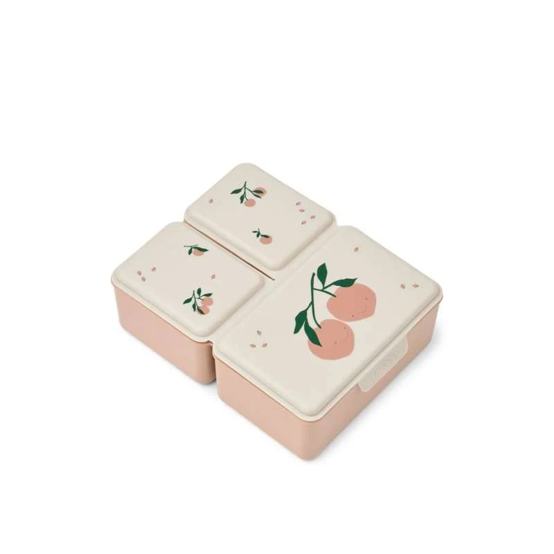 Gomblyukláb Liewood Driss Madkasse - Peach Me/Sea Shell